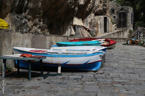 Shot of fishing boats standing in the street in the small village in Furore, Amalfi Coast, Italy
