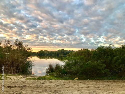 Cumulus clouds over the riv photo