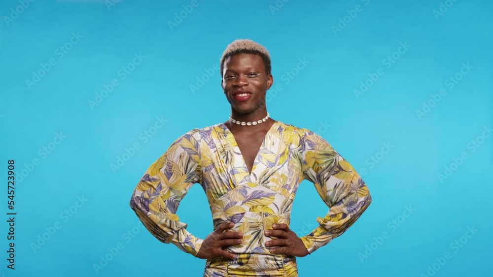 Confident transgender ethnic person on blue background Confident transgender ethnic person on blue background