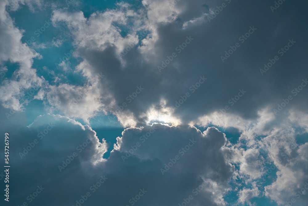 sun rays with blue cloudy sky sun rays with blue cloudy sky