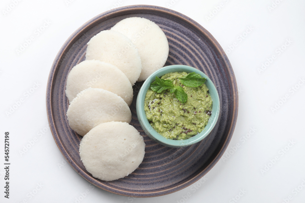 Idli or Idly served with coconut chutney is a popular south indian breakfast Idli or Idly served with coconut chutney is a popular south indian breakfast