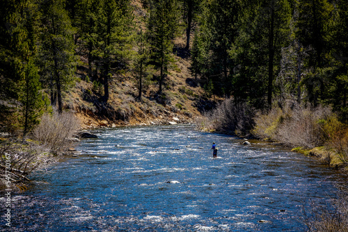 Fly fishing the Truckee river, a beautiful cold clear clean trout stream in California and Nevada close to Lake Tahoe. photo