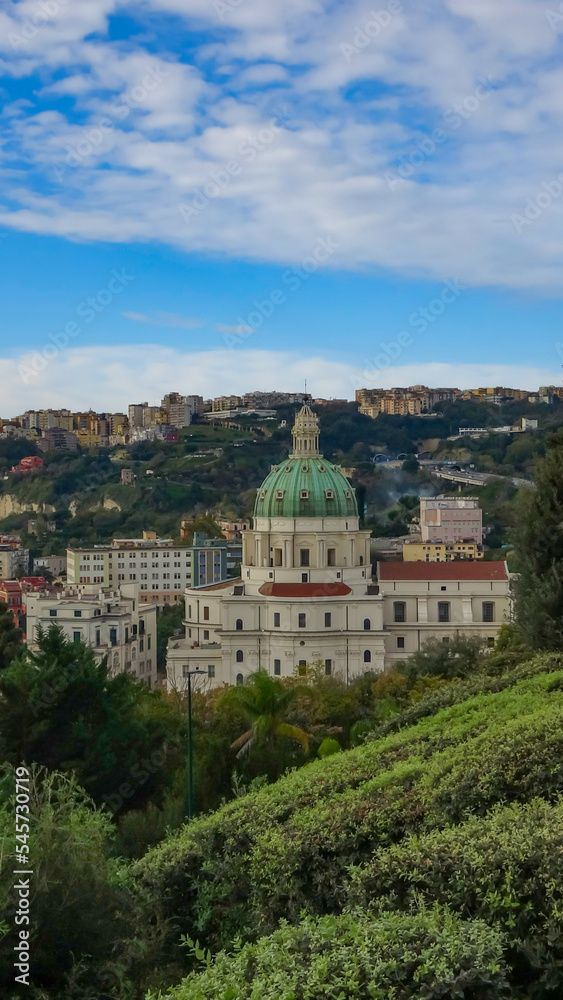 View of the dome of the Saint Mary church from the Capodimonte park in Naples, Italy.