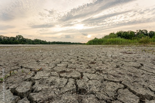 Cracked soil of a dry lake before greenery in Bavaria Germany