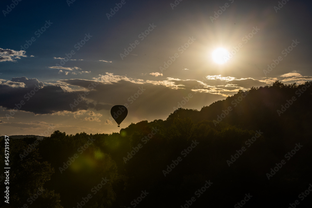 hot air ballon at sunset in Dordogne France hot air ballon at sunset in Dordogne France