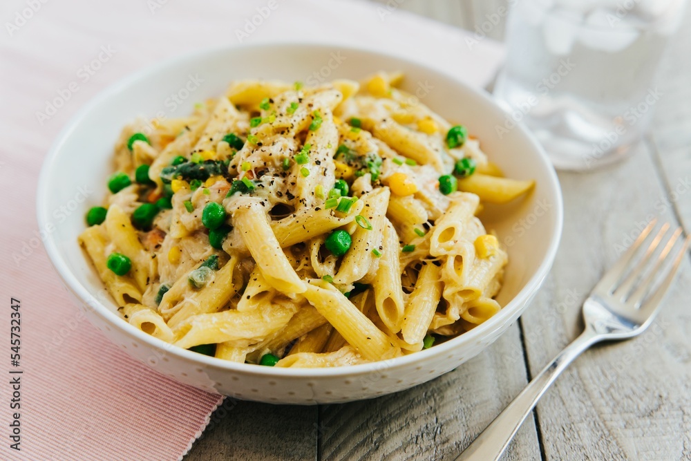 Closeup shot of homemade penne pasta Closeup shot of homemade penne pasta