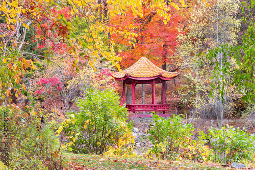 The pagoda at the Chuang Yen Monastery in Putnam County NY is located at the  Seven Jewel Lake. photo
