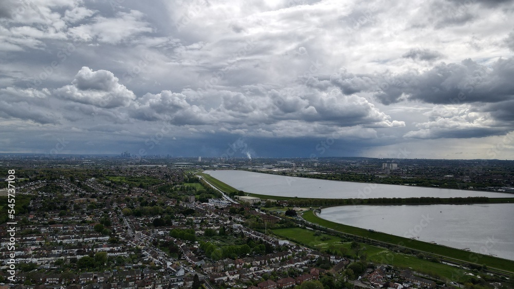 King George's Reservoir Sewardstone Chingford ,London distance in background , dramtic sky drone view