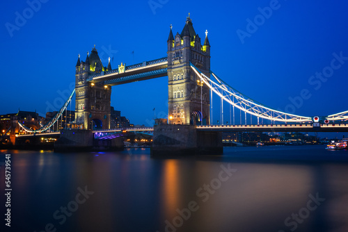 Long exposure  illuminated Tower Bridge over river Thames in London