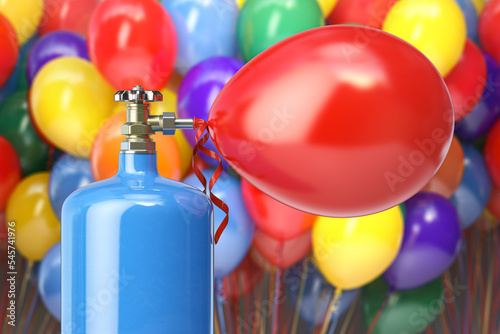 Helium tank  with compressed  helium inflating colored balloons for celebration or party. photo