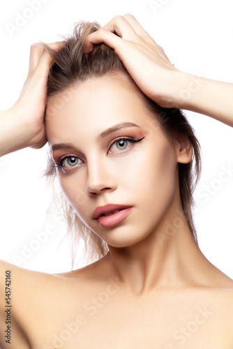 Close-up portrait of beautiful woman with make-up, clean skin