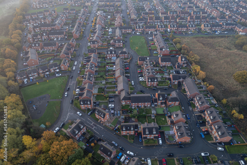 Fototapeta premium Aerial Houses Residential British England Drone Above View Summer Blue Sky Estate Agent Morning Sunrise House Prices 2022.