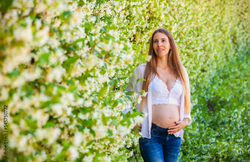 pregnant woman outdoors in the park