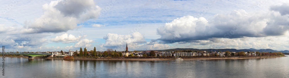 Cityscape and riverside of Rhein river in Bonn, Germany. Autumn promenade on a cloudy day