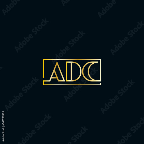 ADC minimal letter logo design with golden color
 photo