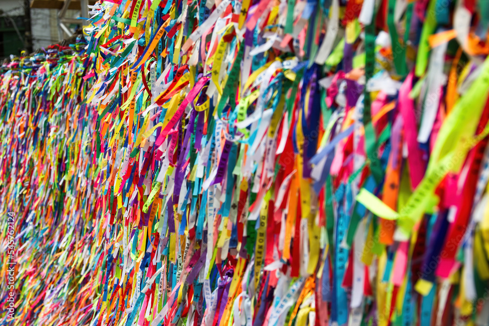 Wall of colored ribbons of wish in the famous Nosso Senhor do Bonfim da Bahia Church in Salvador Bahia Brazil