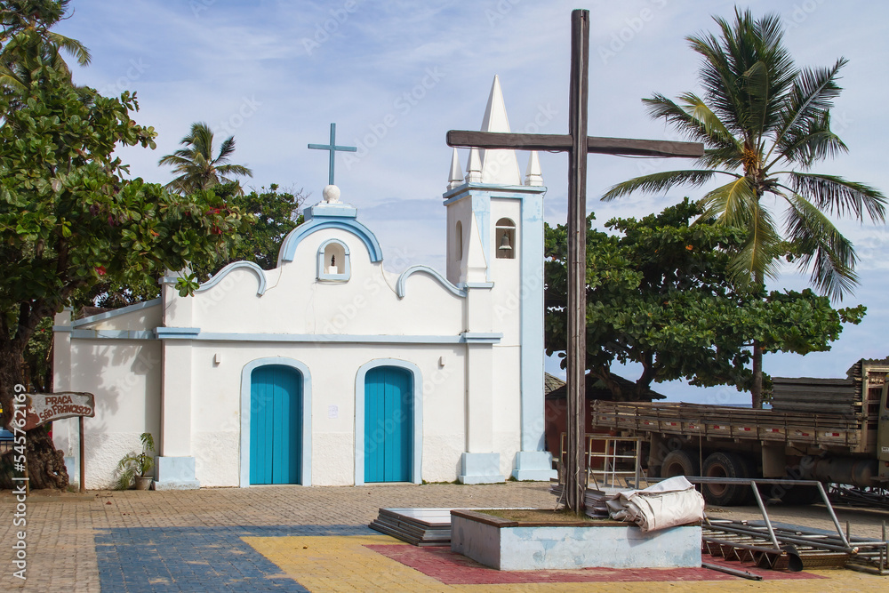 Tourist beach with colonial church (Igreja São Francisco de Assis) and ...