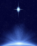Christmas star above planet earth in night sky with stars