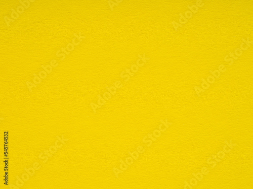 Bright yellow paper, cardboard texture for winter season festival card, patchwork, new year designs decoration, background concepts, text, lettering, wall screen saver, art work. Blank page pattern.