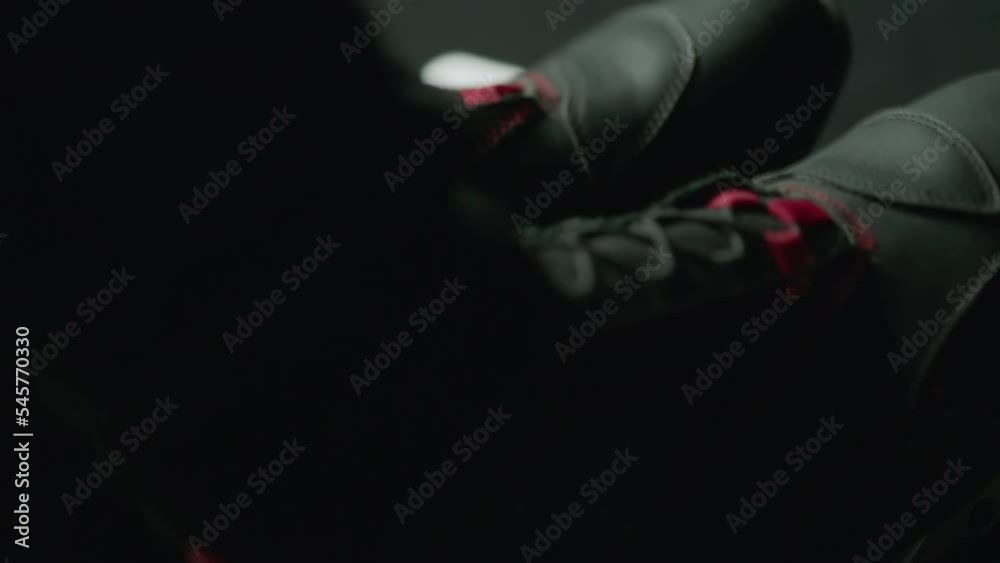 CU view of driver's legs pressing on pedals while racing inside a sports car