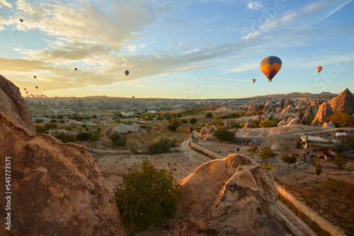 Colorful hot air balloon flying over Cappadocia, Turkey © яна винникова