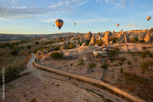 Fototapeta Hot air balloons flying in sunset sky Cappadocia, Goreme, Turkey