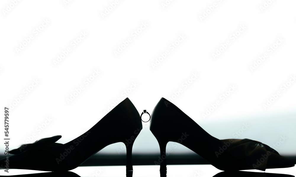 wedding ring and shoes silhouette - wedding photo