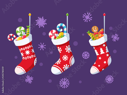 Christmas Socks with Cute Ornaments and Sweet Gifts. Stockings with Candy Canes, Lollipops and Gingerbread Bakery