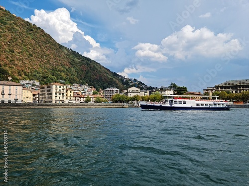 Lake Como country on a summer sunny day. View of the bay. Lake Como and mountains. Scenic view of the resort town. Beautiful Italian landscape. © Liudmyla Leshchynets