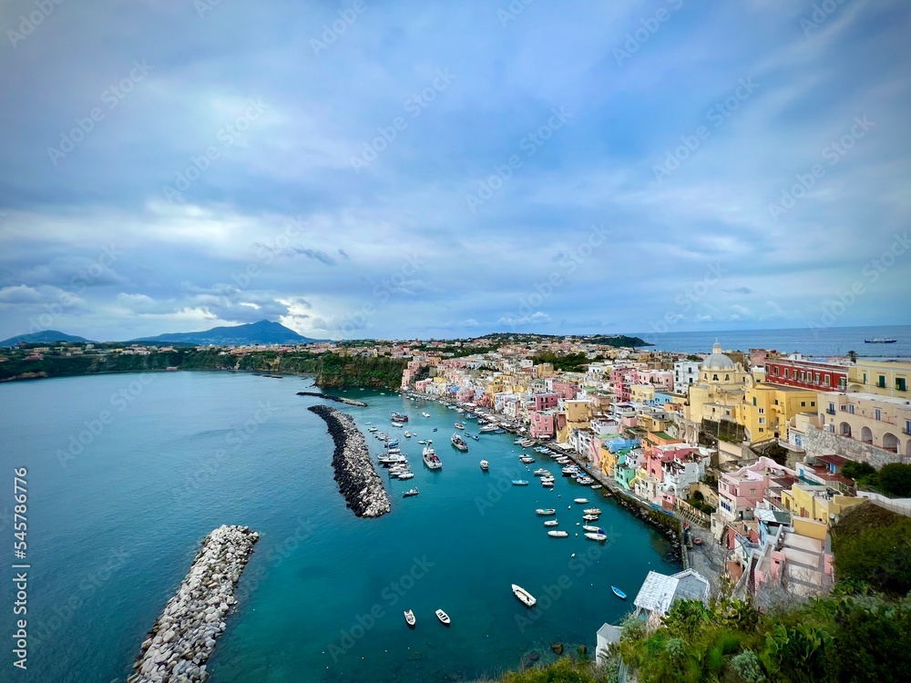view of the port country. View of the Corricella neighbourhood. Island of Procida. Colourful houses facing the sea. Old fishermen's houses. Campania. Italy