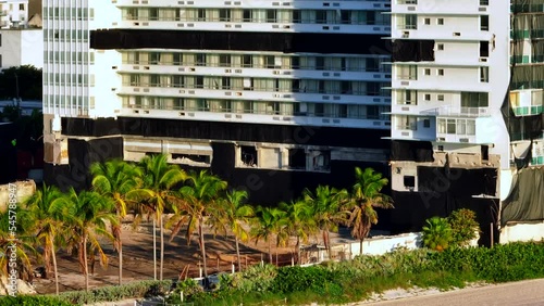 Closeup aerial drone video Miami Beach Deauville Beach Resort implosion collapse