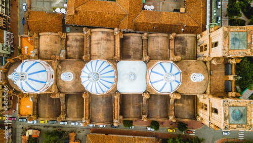 Aerial Drone Fly Above Three White Domes New Cathedral Cuenca Ecuador Immaculate Conception, Religious Iconic Architecture in Latin American Colonial City photo