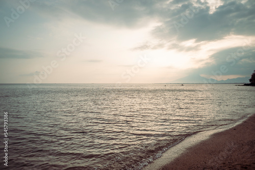 Sea scape of local destination on East Java when Sunrise time. The photo is suitable to use for nature background, quotes poster and adverting.