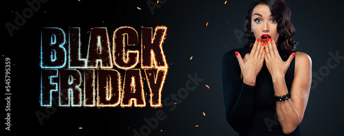 Sale offer. Shopping discount. Black Friday Concept. Girl isolated on dark background at shopping. Neon sign at blackfriday november shopping holiday. photo