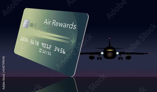 Here is a mock air miles reward credit card that features the outline of an airplane in the design. It is green on a black background and has a generic logo and EMV chip. photo