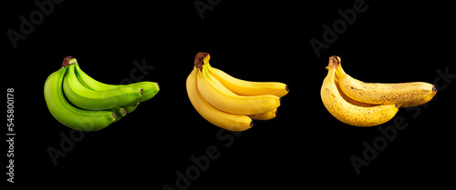 Banana ripeness stages on a black background photo