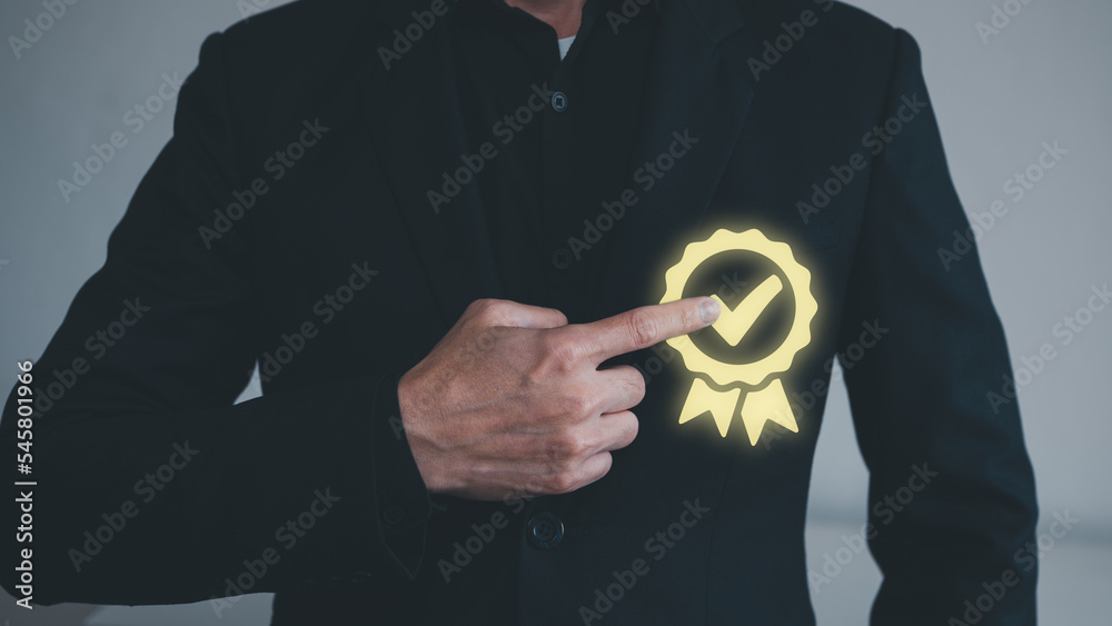 best quality and best service assurance concept, a man pointing at a symbol of top service guarantee, best quality and best service assurance concept, a man pointing at a symbol of top service guarantee,