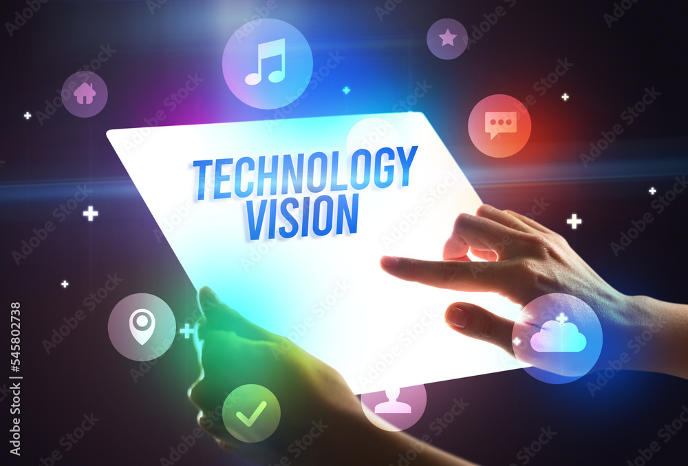 Holding futuristic tablet, new media concept Holding futuristic tablet, new media concept