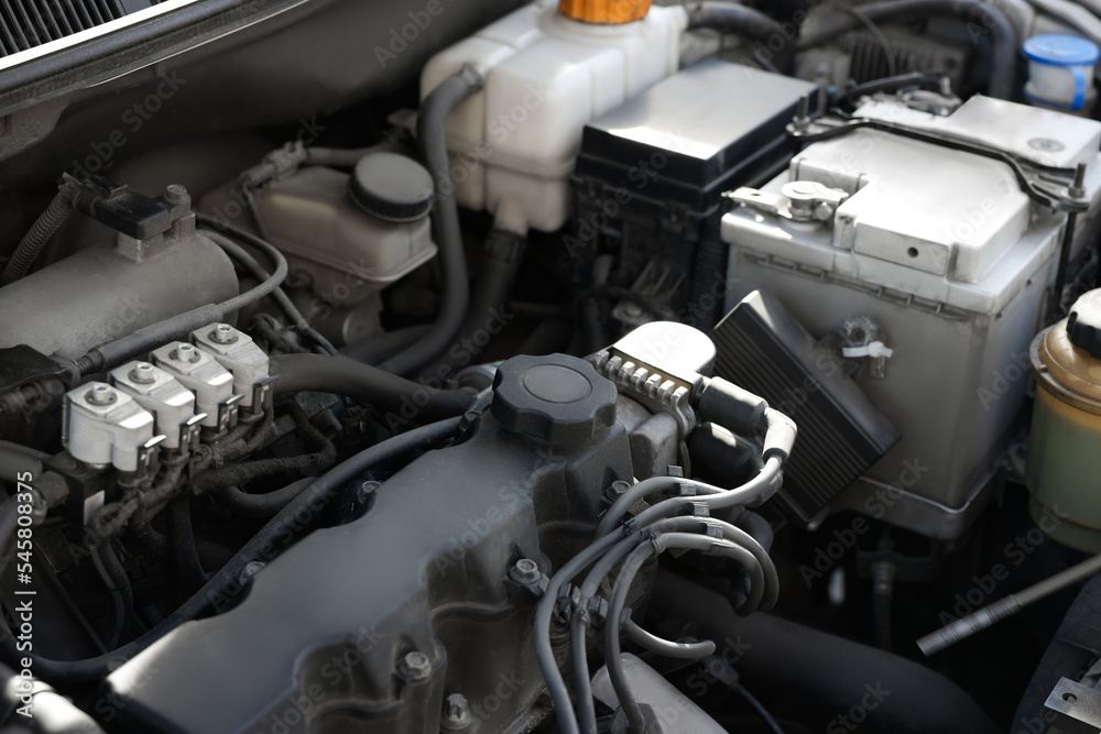 Closeup view of engine bay in modern auto Closeup view of engine bay in modern auto