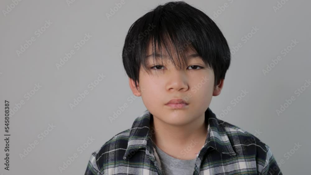 Unhappy teenager open his eyes and stares the camera unsatisfied. Dolly in. Unhappy teenager open his eyes and stares the camera unsatisfied. Dolly in.
