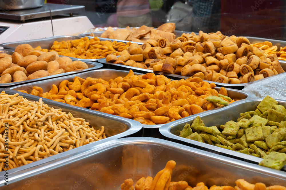 Bhujia, a spicy deep-fried sev filled with a burst of flavors, made using gram flour, moth flour, and different spices, crispy & crunchy traditional namkeen being sold in Jodhpur, Rajasthan, India.