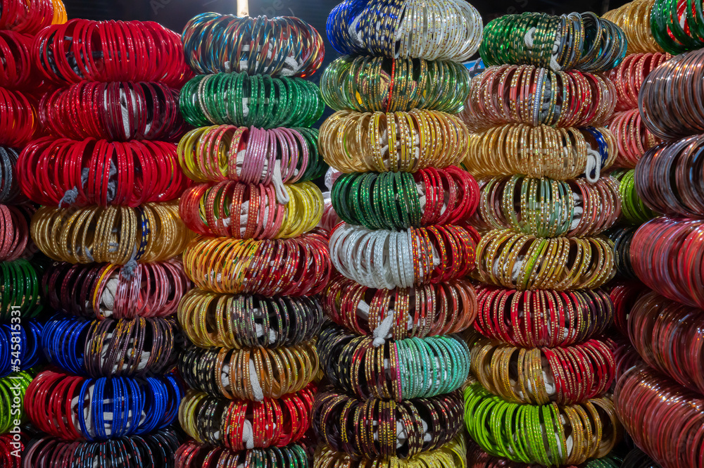 Beautiful Rajasthani Bangles being sold at famous Sardar Market and Ghanta ghar Clock tower in Jodhpur, Rajasthan, India. Beautiful Rajasthani Bangles being sold at famous Sardar Market and Ghanta ghar Clock tower in Jodhpur, Rajasthan, India.