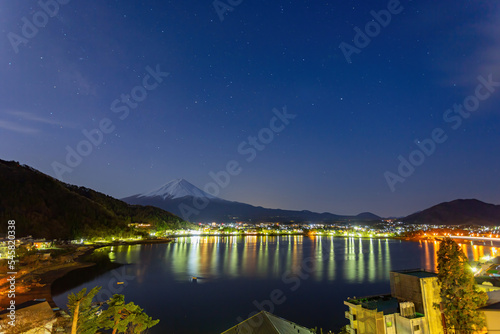 Night high angle view of the Mt. Fuji with cityscape photo