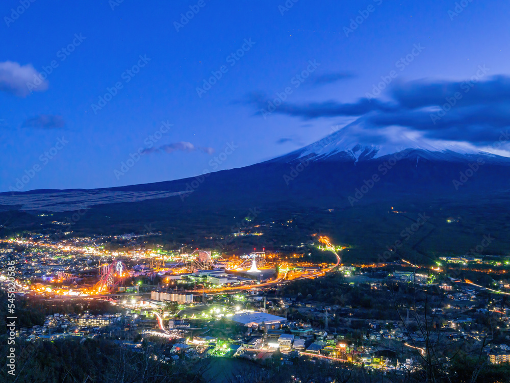 Twilight high angle view of the Mt. Fuji with cityscape