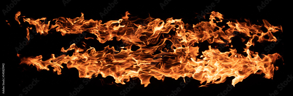 Flame on a black background. Abstract natural background or texture. Flame on a black background. Abstract natural background or texture.
