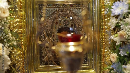 candles in the Orthodox church in front of the icon of the Kazan Mother of God