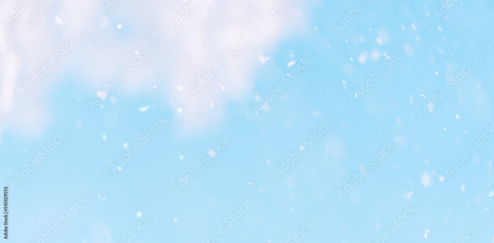 Background of falling snow against the blue sky. Background of falling snow against the blue sky.