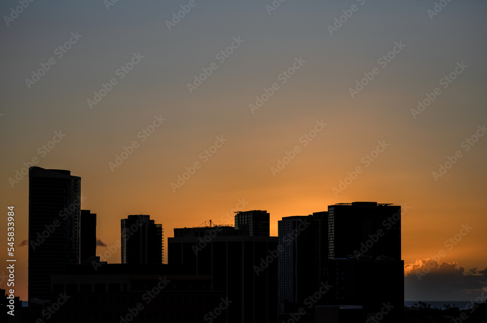 Autumn Sunset with Silhouetted Skyscrapers.