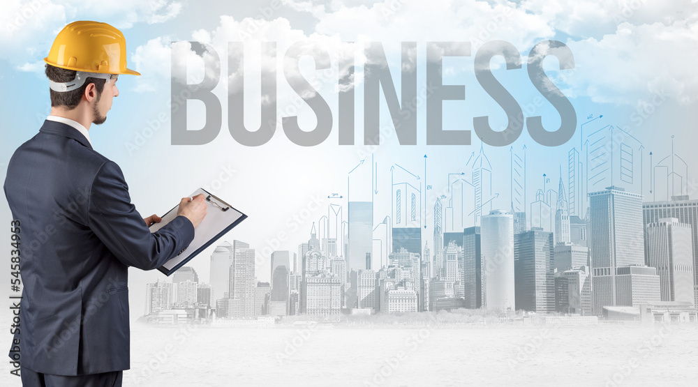 Young businessman with hard hat