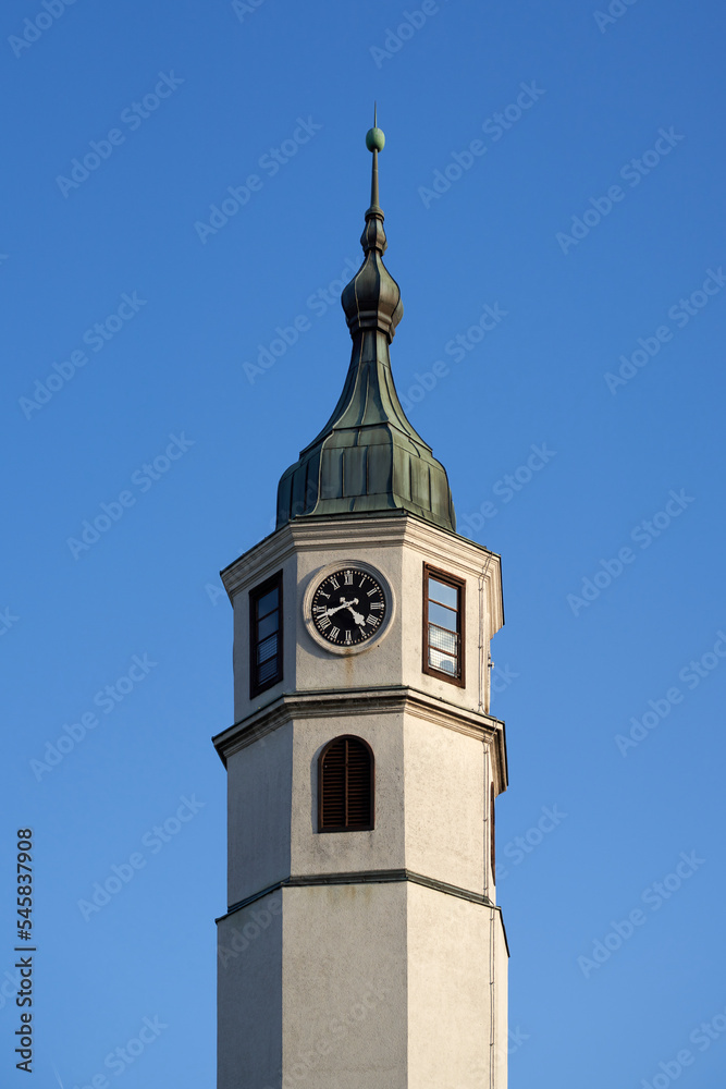 Close-up of the clock on the old tower.